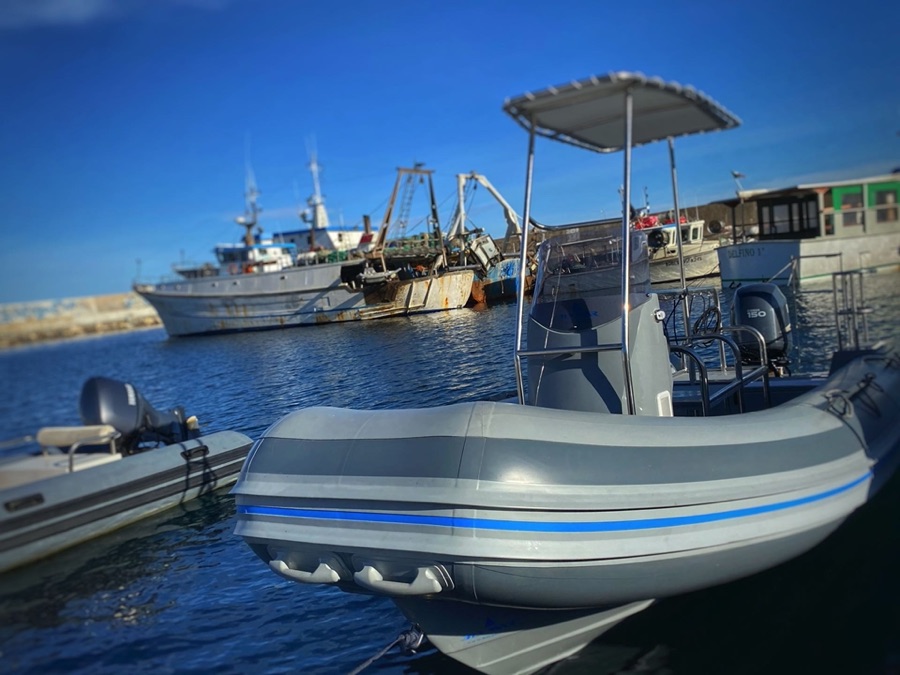 Base One dive boat at Cala Gonone harbour