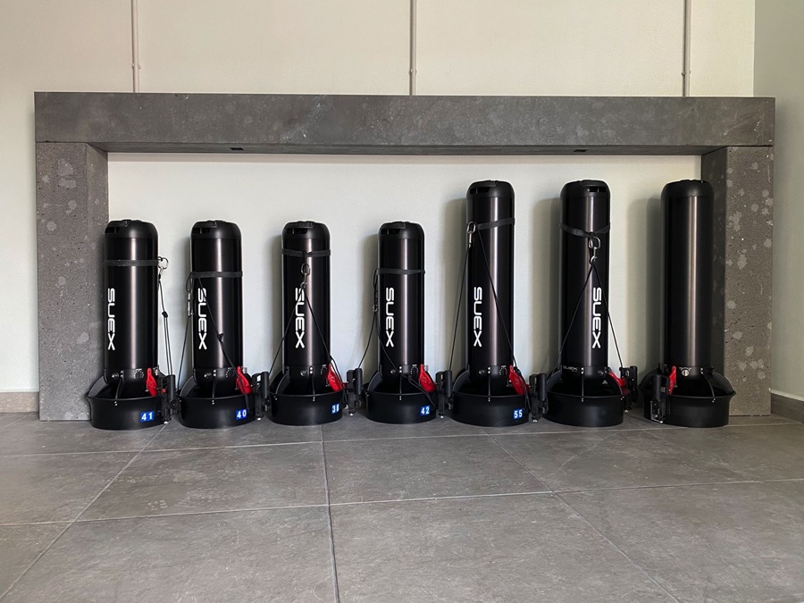 SUEX DPV scooters charging at Base One dive centre